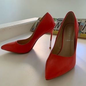 Casadei. Beautiful red coral color pumps. Barely any signs of wear. Size 8.5.